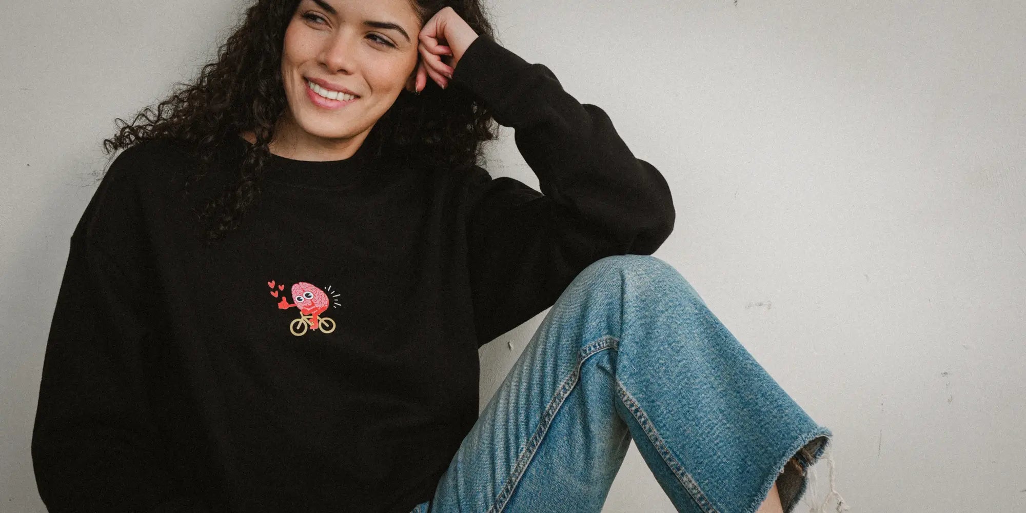 Woman in 'Idea with Legs' graphic heavyweigh boxy sweatshirt , front view, soft fleece