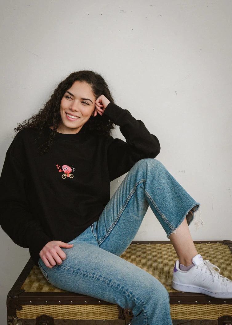 Woman in 'Idea with Legs' graphic heavyweigh boxy sweatshirt , front view, soft fleece